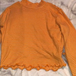 Long sleeve orange stripped turtle neck crop top